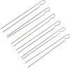 A set of metal skewers arranged diagonally on a white background. Produktbild-Vorschau
