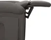 A close-up view of the side of a recliner chair, showing the reclining mechanism. Náhľad obrázku produktu