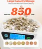 A coin counting machine filled with coins, with text overlays highlighting its capacity. Voir les images du produit