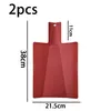 A red foldable cutting board with dimensions indicated. Produktbild-Vorschau