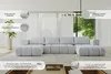A modern living room with a large U-shaped sectional sofa. Produktbild-Vorschau