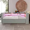 A modern bedroom or living room setting with a sofa bed. Produktbild-Vorschau