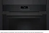 Close-up of the control panel and upper part of a black oven. Produktbild-Vorschau