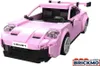 A pink toy sports car made of building blocks, displayed on a white background. Voir les images du produit