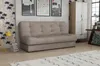 A beige sofa bed is shown in a room with patterned wallpaper and framed pictures on the wall. Produktbild-Vorschau