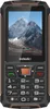 A front view of a rugged mobile phone with a mountain landscape wallpaper on its screen. Náhled obrázku produktu