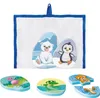 A mesh bag containing two puzzle pieces with a polar bear and a penguin, and three separate puzzle pieces with a flamingo, a frog, and a seal, laid out below. Produktbild-Vorschau