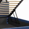 Close-up view of the internal mechanism of a bed frame, showing the wooden slats and hydraulic lift system. Produktbild-Vorschau
