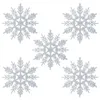 Five silver glitter snowflakes are arranged in a scattered pattern on a white background. Produktbild-Vorschau