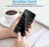 A hand holding a smartphone displaying an alarm clock app, with a cup of coffee and a notebook in the background. Produktbild-Vorschau