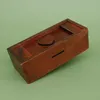 Trickkiste aus Holz mit Herzsymbol – ideal als Geschenkbox oder stilvolle Spardose mit Geheimfach. Náhľad obrázku produktu