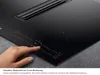 A hand touches the control panel of a black induction cooktop with an integrated range hood. Anteprima dell’immagine prodotto
