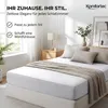 A bedroom scene with a neatly made bed. Produktbild-Vorschau