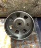 A close-up of a clutch drum for a STIHL chainsaw, resting on a surface with packaging visible. Produktbild-Vorschau