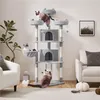 A multi-level cat tree with several cats interacting with it, placed in a living room setting. Podgląd zdjęcia produktu