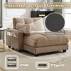 A close-up view of a khaki-colored sofa with integrated USB ports and cup holders, showcasing its features. Produktbild-Vorschau