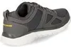 A side view of a gray Skechers athletic shoe with a white sole. Anteprima dell’immagine prodotto