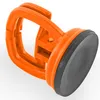 A close-up studio shot of an orange suction cup dent puller. Produktbild-Vorschau