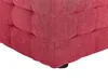 A close-up view of the corner of a red fabric ottoman. Náhled obrázku produktu