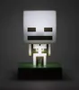 A Minecraft skeleton lamp on a green base. Náhled obrázku produktu