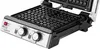 A close-up, angled view of an open waffle maker on a white background. Produktbild-Vorschau