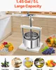 A fruit press is shown in a kitchen setting, with various fruits and juices displayed around it. Voir les images du produit