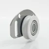 A close-up, studio shot of a roller bearing with a mounting plate. Produktbild-Vorschau