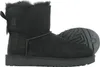 A black Ugg boot is shown from the side against a white background. Produktbild-Vorschau