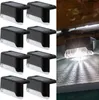 A collage of solar-powered fence lights, with one light shown installed and illuminating a wooden surface. Produktbild-Vorschau