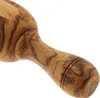 Close-up of a wooden kitchen utensil, likely a pestle or part of a press. Produktbild-Vorschau