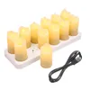 A set of 12 LED candles on a charging base with a USB cable. Náhled obrázku produktu