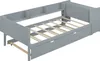 A grey wooden bed frame with a pull-out bed and shelves. Podgląd zdjęcia produktu