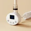 A close-up shot of a white electric towel rail heating element with a digital display and control buttons, set against a plain light beige background. Produktbild-Vorschau
