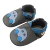 A pair of baby shoes with car appliques. Produktbild-Vorschau