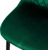 A close-up view of a dark green velvet chair seat. Náhľad obrázku produktu