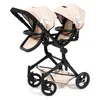 A twin doll stroller on a white background. Produktbild-Vorschau