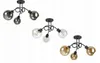 Three different versions of a black ceiling light fixture with three bulbs each, displayed against a white background. Produktbild-Vorschau