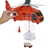 A hand is shown operating a toy rescue helicopter, lowering a rescue basket with a toy ambulance inside. Anteprima dell’immagine prodotto