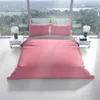 A bed with pink and gray striped bedding is set against a large window with a view of a landscape. Produktbild-Vorschau