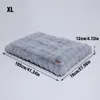 A gray plush dog bed with size dimensions indicated. Podgląd zdjęcia produktu