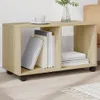 A wooden rolling cabinet with books and a cup on top, placed on a floor. Náhled obrázku produktu