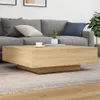 A living room scene with a couch and coffee table. Náhľad obrázku produktu