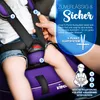 A child is sitting in a car seat, with a hand adjusting the harness. Náhľad obrázku produktu