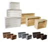 A collage of wooden crates in various colors and sizes, some stacked and some arranged in rows. Produktbild-Vorschau