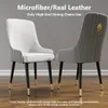 Two dining chairs are shown against a plain background. One chair is white and the other is gray. Text overlays provide product information. Produktbild-Vorschau
