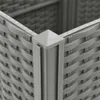 Close-up view of the corner of a grey woven planter box. Podgląd zdjęcia produktu