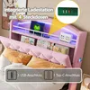A pink upholstered bed with integrated shelving and lighting, featuring a charging station with USB and Type-C ports. Náhled obrázku produktu