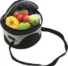 A cooler bag filled with vegetables and a can of soda. Náhled obrázku produktu