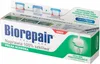 A product box for Biorepair toothpaste, showing illustrations of teeth and product benefits. Produktbild-Vorschau