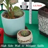 A close-up of several potted plants and a ruler, with text overlay at the bottom. Produktbild-Vorschau